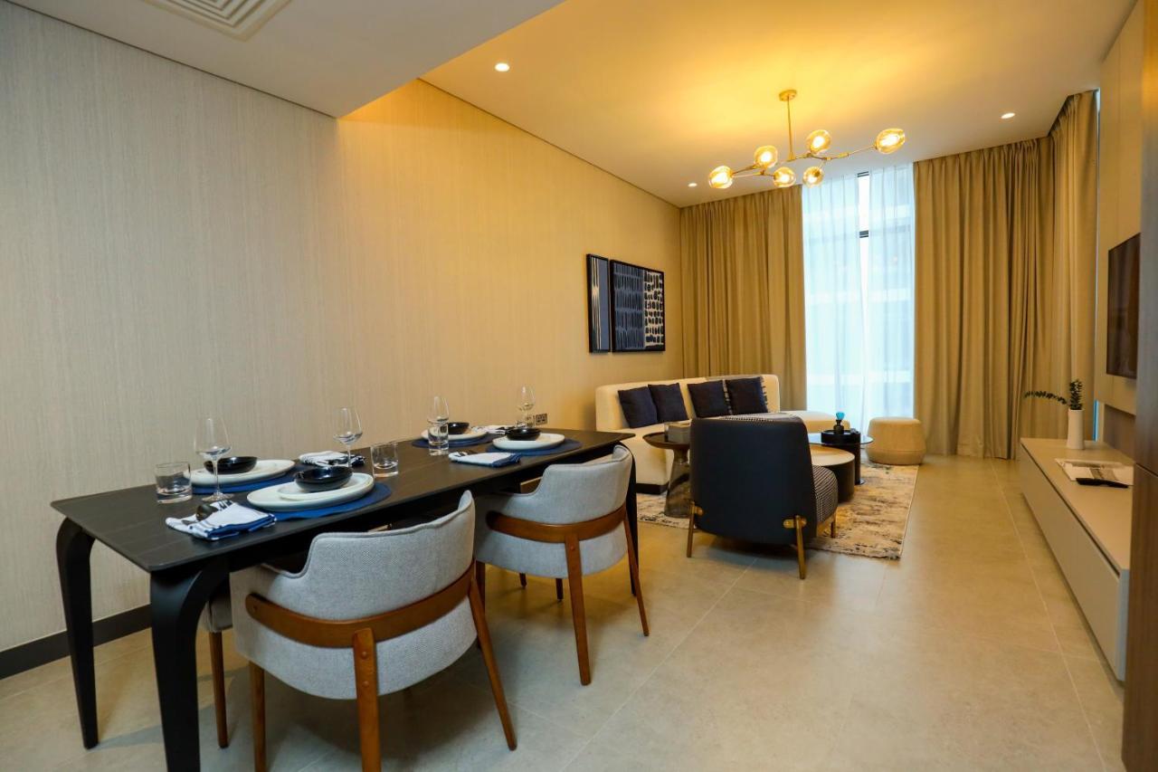 Hotel Charthouse Bahrain Manama Exterior foto A living room in a typical apartment