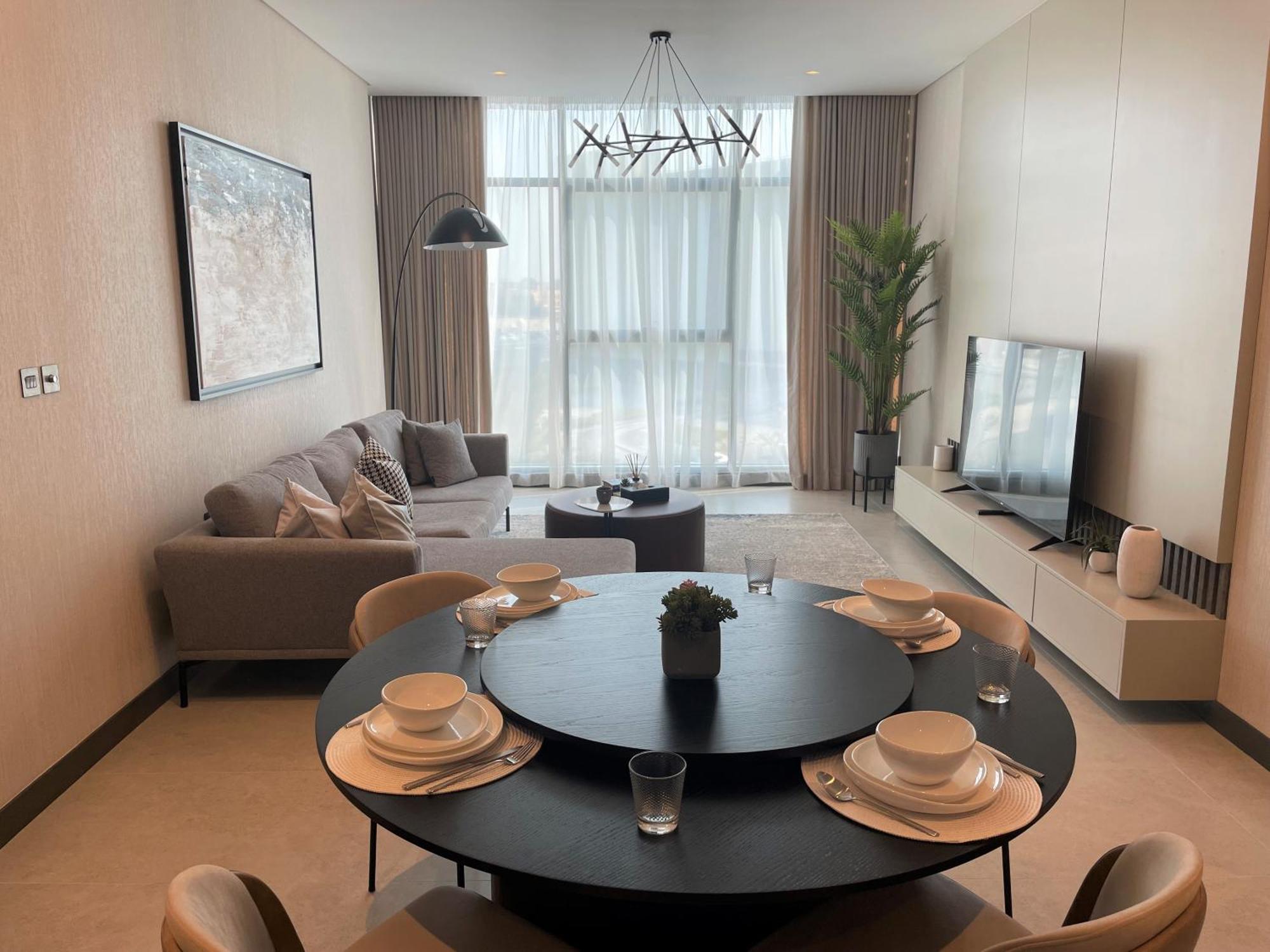 Hotel Charthouse Bahrain Manama Exterior foto A living room in a typical apartment